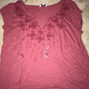 pink embroidered shirt